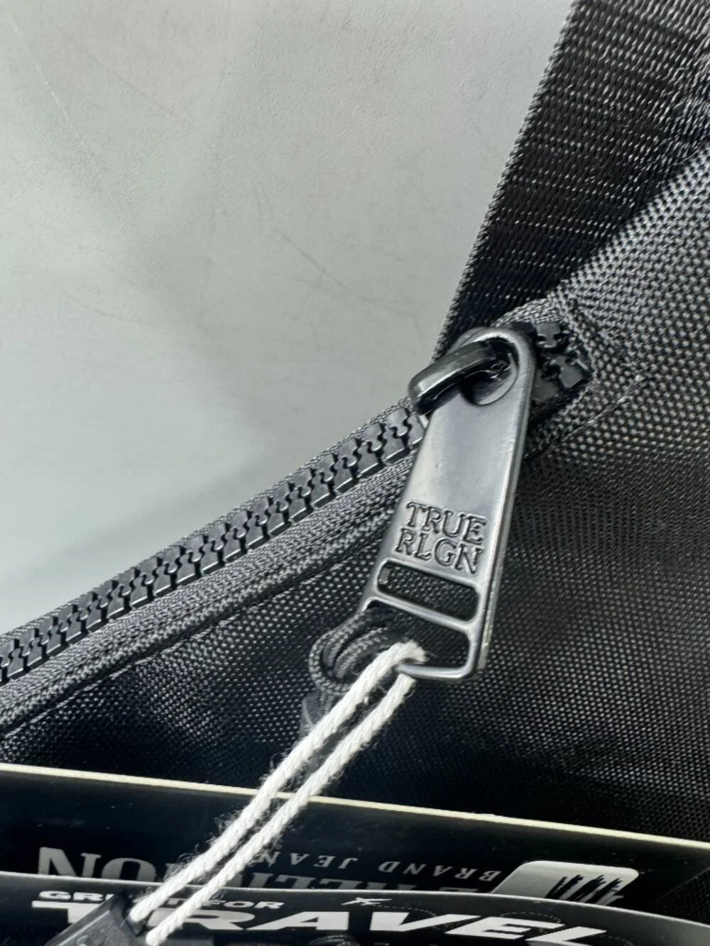True Religion zip around